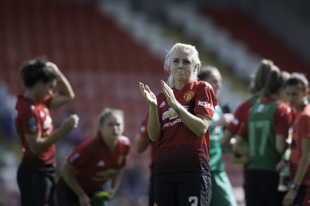 Alex Greenwood applauding the fans