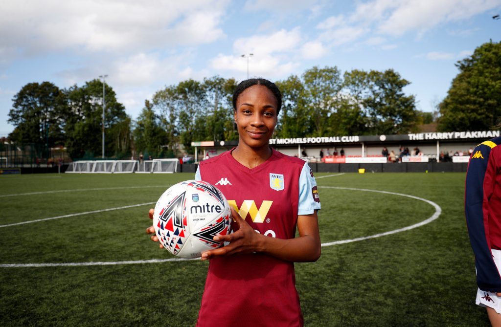 Melissa Johnson of Aston Villa Women celebrates the match ball.