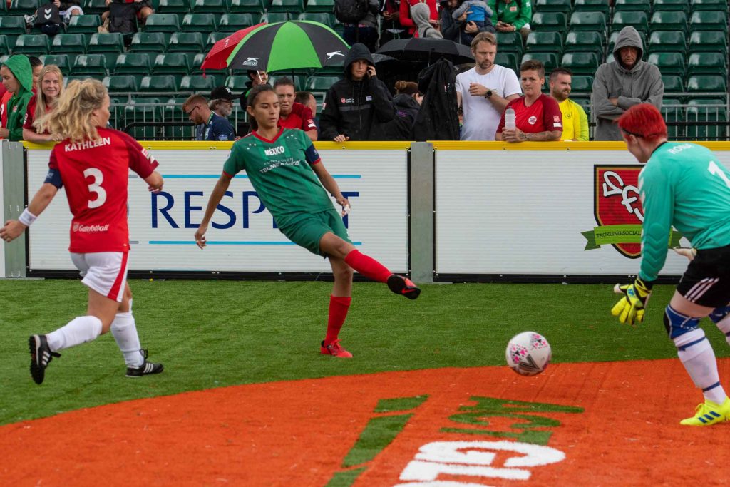 Mexico player shooting at goal at Homeless World Cup