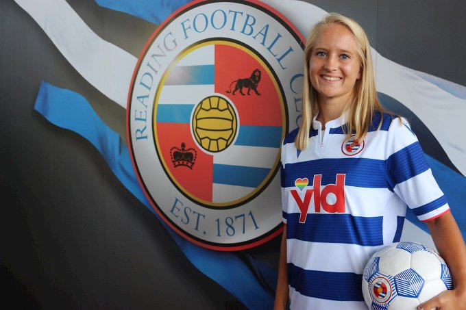 Amalie Eikelad in front of Reading FC Crest