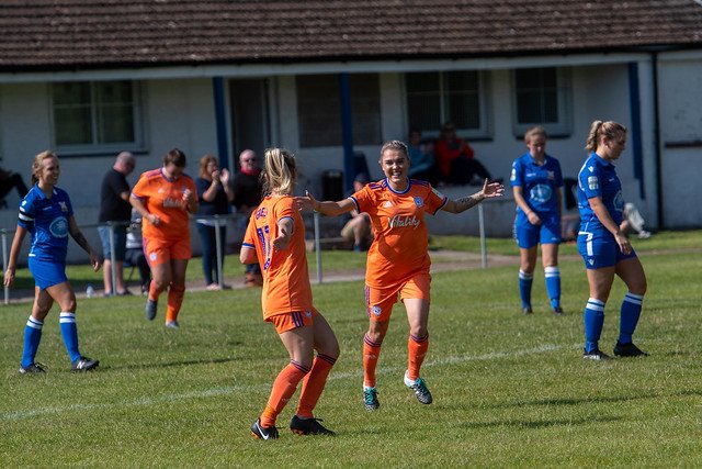 Cardiff City FC celebrate a goal at Abergavenny. 