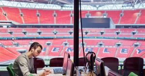 UCFB student studying inside Wembley Stadium