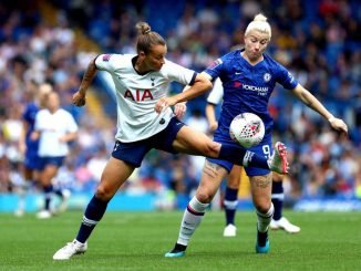 Ria Percival of Spurs challenges Chelsea's Bet England
