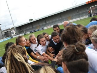 Chris Phillips in London City Lionesses huddle.