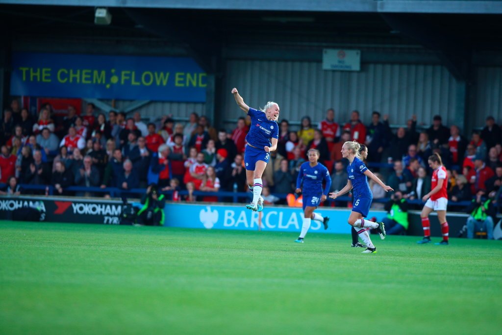 Chelsea celebrate a goal in the defeat of Arsena