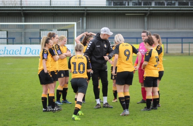 Ben Yeomans withCambridge United players.