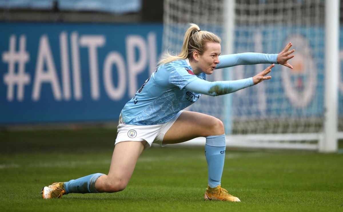 Man City's Lauren hemp celebrates