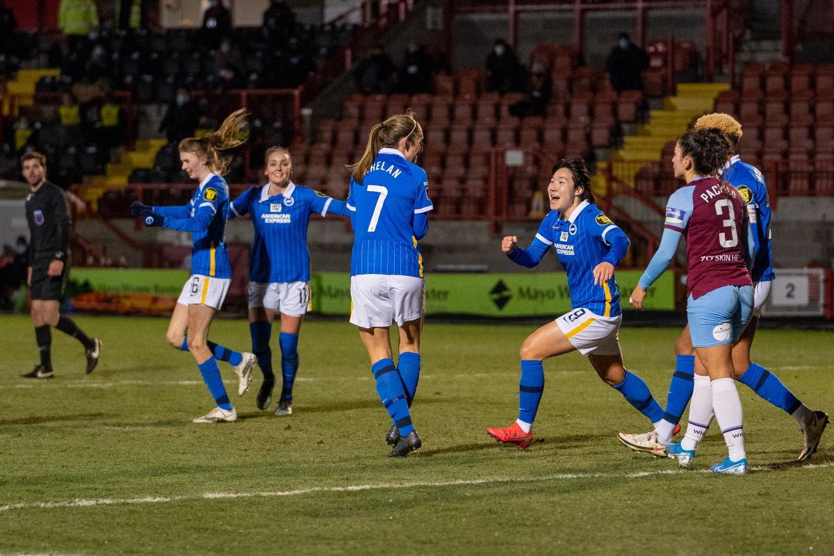 Brighton celebrate Aileen Whelan's goal