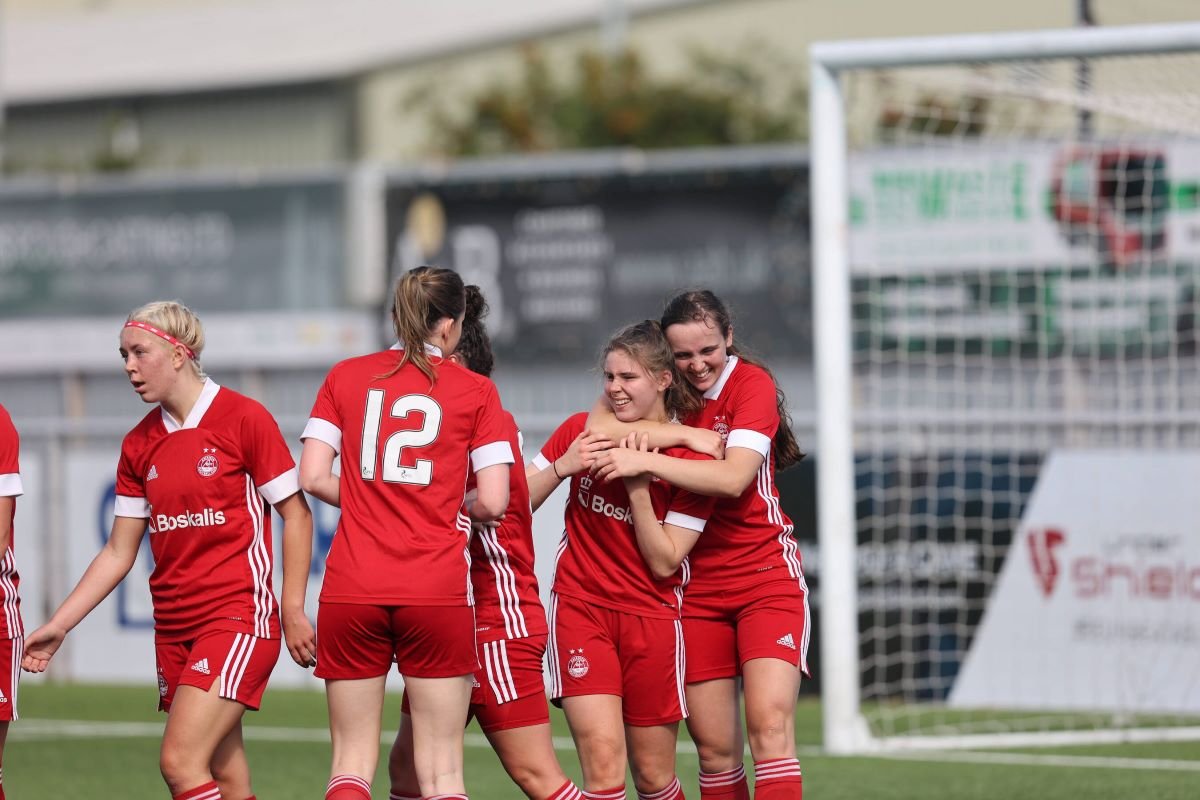 Aberdeen players celebrate a goal