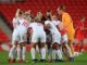 England players in a huddle