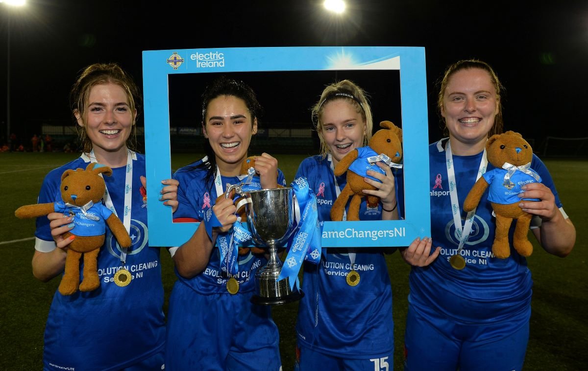 Lisburn players celebrate promotion