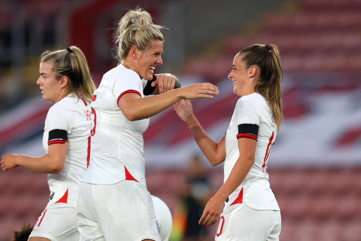 Ella Toone celebrates a goal for England