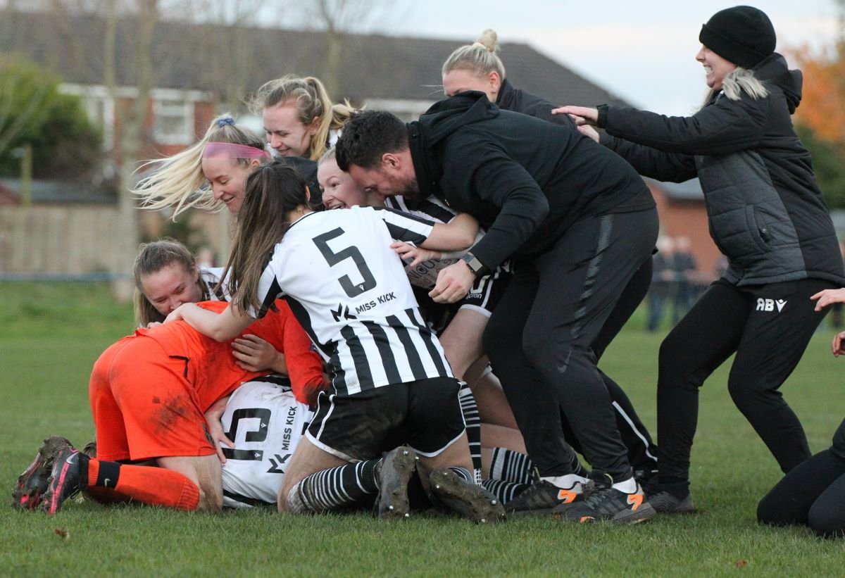 Chorley celebrate after shoot-out victory.