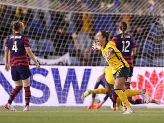 Australia's Kyah Simon celebrates her equaliser against the USA