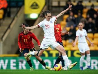 England's Jill Scott goes for goal