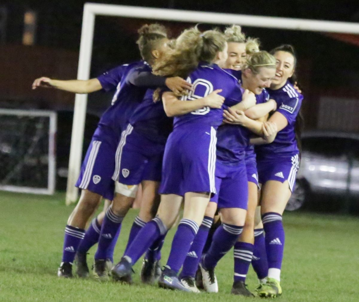 Leeds United celebrate their late winner at Barnsley