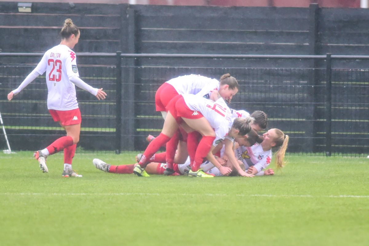 Lewes celebrate the opening goal at Watford