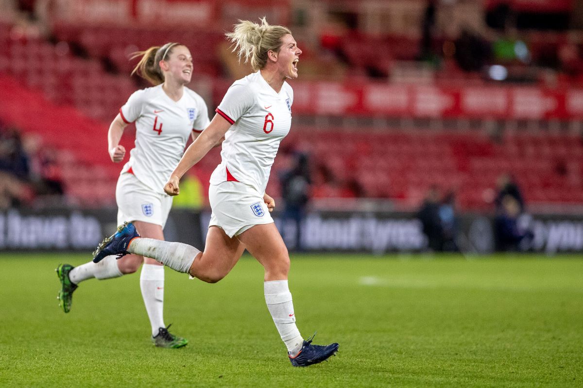 Millie Bright celebrates her goal against Canada