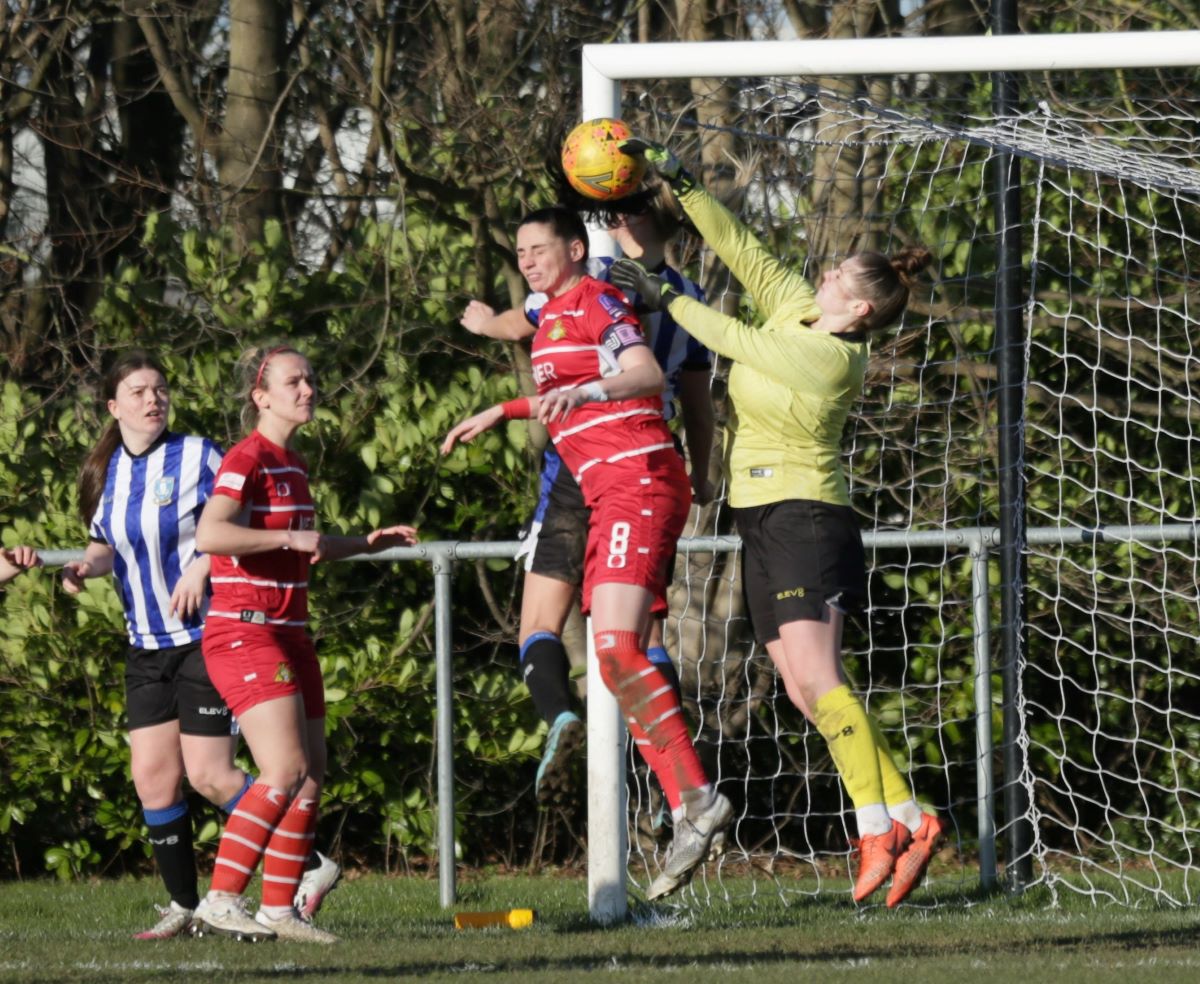 Sheffield & Hallamshire Doncaster Rovers Belles won 3-1 away to Sheffield Wednesday to reach the quarter-finals. Goals from Jess Andrew and Jasmine Saxton had Belles 2-0 up inside half an hour and heading for the expected win, but Shannon Coughlan reduced the deficit before the interval to give Wednesday hope. Saxton's second shortly after half time made it 3-1 and she had chances for a hat trick, but was denied by Wednesday keeper Megan Parkin who made several decent saves during the game to restrict Belles to a narrower margin of victory than would have been expected beforehand. Pic shows Megan Parkin clearing a corner from Jess Andrew (red) with Jasmine Saxton the other pictured Belles