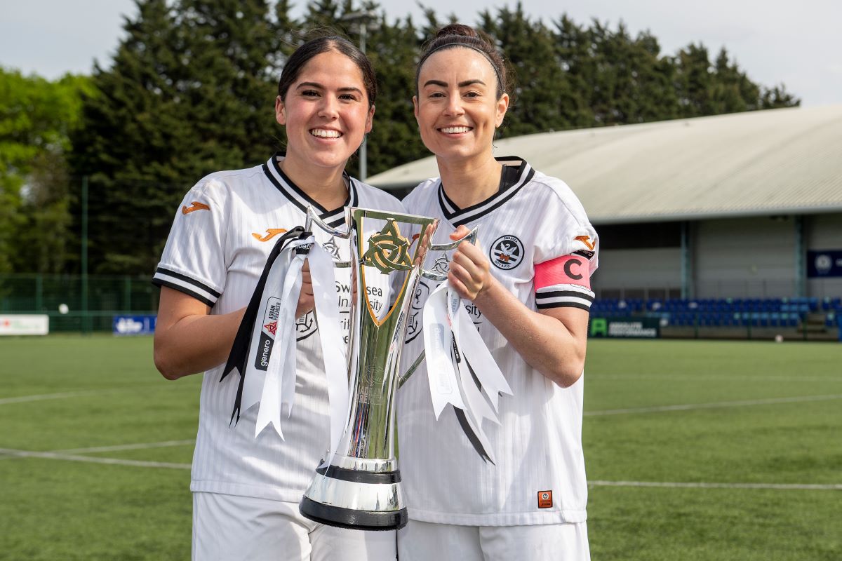 Swansea City players with Genero Adran Premier trophy