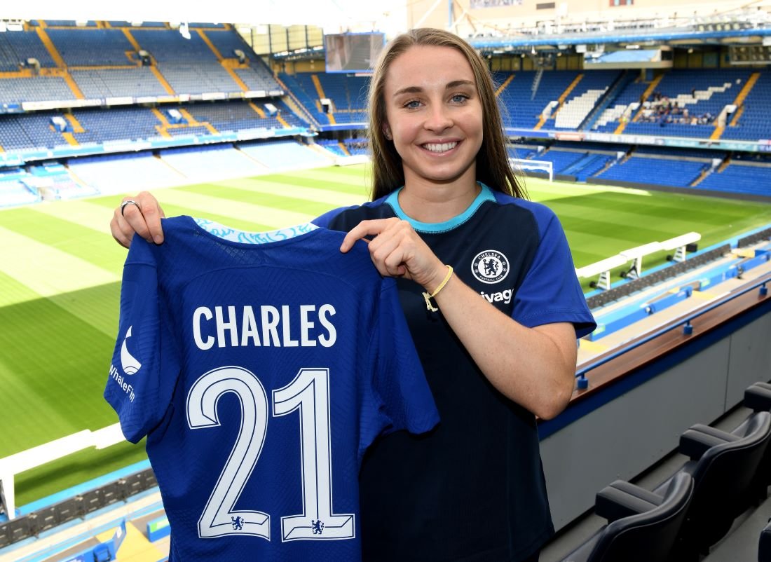 Niamh Charles signs
