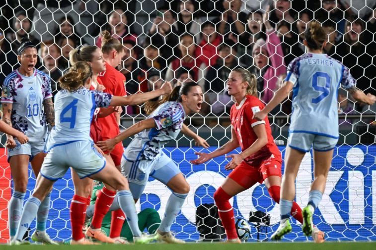 FBL-WC-2023-WOMEN-MATCH49-SUI-ESP Spain's defender #14 Laia Codina celebrates scoring her team's fourth goal during the Australia and New Zealand 2023 Women's World Cup round of 16 football match between Switzerland and Spain at Eden Park in Auckland on August 5, 2023. (Photo by Saeed KHAN / AFP) (Photo by SAEED KHAN/AFP via Getty Images)