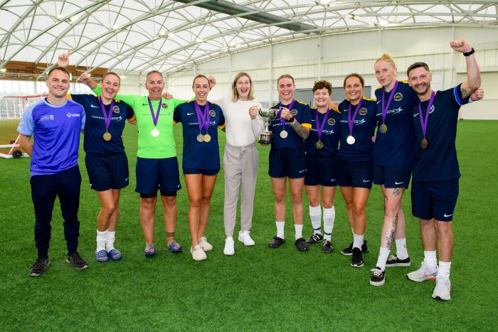 Lioness Ellen White with tournament winners from the Royal Navy