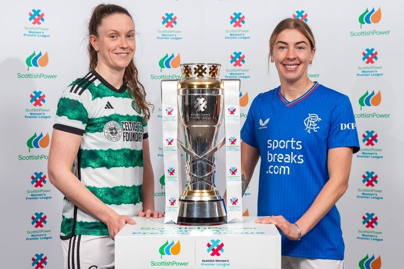 Celtic and Rangers players with the SWPL trophy