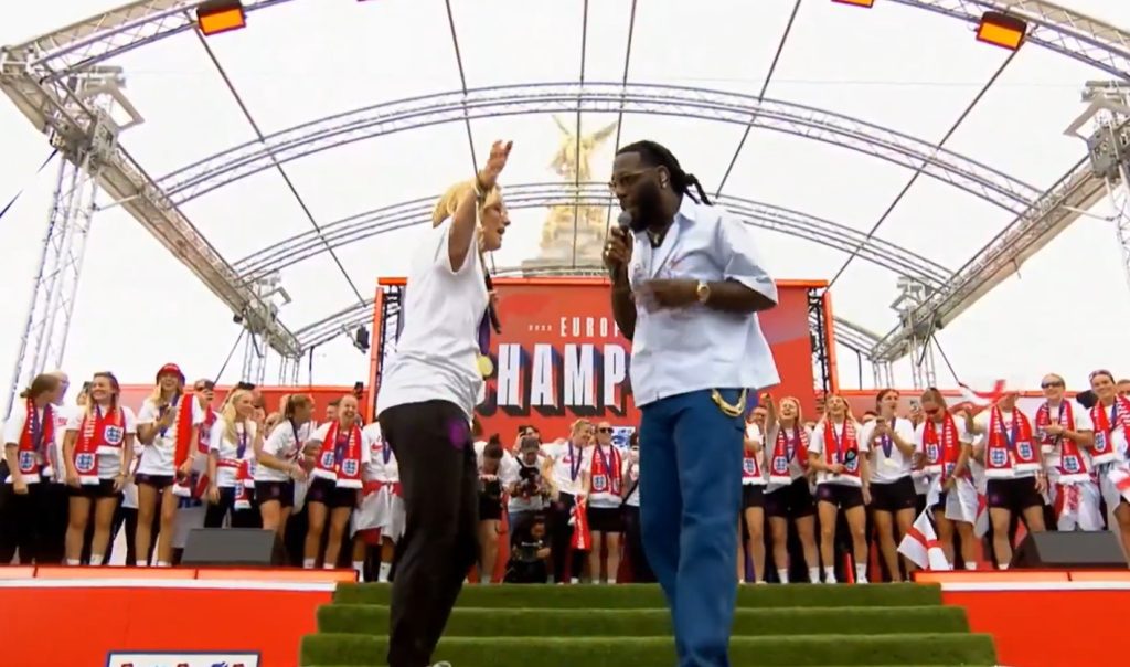 Sarina Wiegman dances with Burna Boy during England Euro 2025 trophy parade