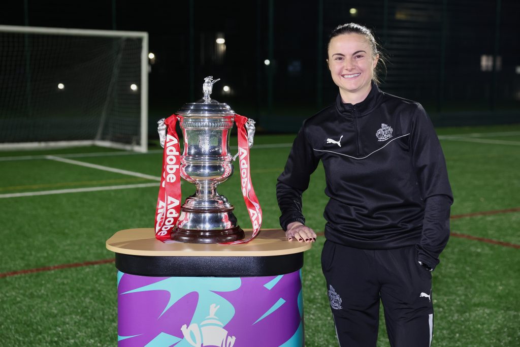 MANCHESTER, ENGLAND - DECEMBER 09: Adobe Women's FA Cup trophy visit to Altrincham FC Women at Partington Sports Village on December 09, 2025 in Manchester, England. (Photo by Alex Livesey - The FA/The FA via Getty Images)