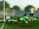 Young female goalkeeper training with coach guidance on grass pitch during skill development session