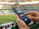 Digital voting interface on smartphone with football stadium background representing WSL awards public vote