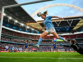 Man City Women player scoring header at Wembley during FA Cup final victory over Brighton