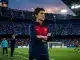 Barcelona coach on sideline during UEFA Women's Champions League match with intense focus