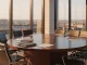 Modern European boardroom with executive chairs symbolizing women's leagues gaining representation