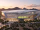 Modern enclosed stadium design in Arizona desert landscape for women's football expansion