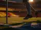 Stadium evening kick-off with motion-blurred boot and ball in corner, blue-white and yellow-red colour palette.