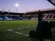 Empty football technical area representing Dario Vidosic’s potential move from Brighton to Angel City