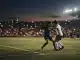 Women’s football knockout match under stadium lights in Morocco