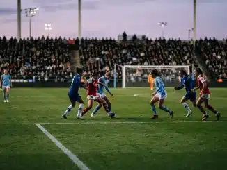 Three women’s football teams converge in a tense stadium midfield scene for the WSL title race
